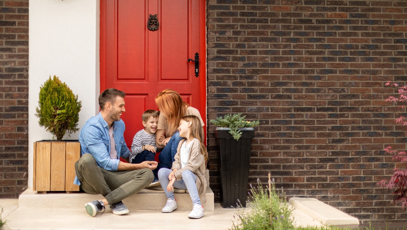 parents,with,children,look,at,panoramic,window,together,,relaxing,together,